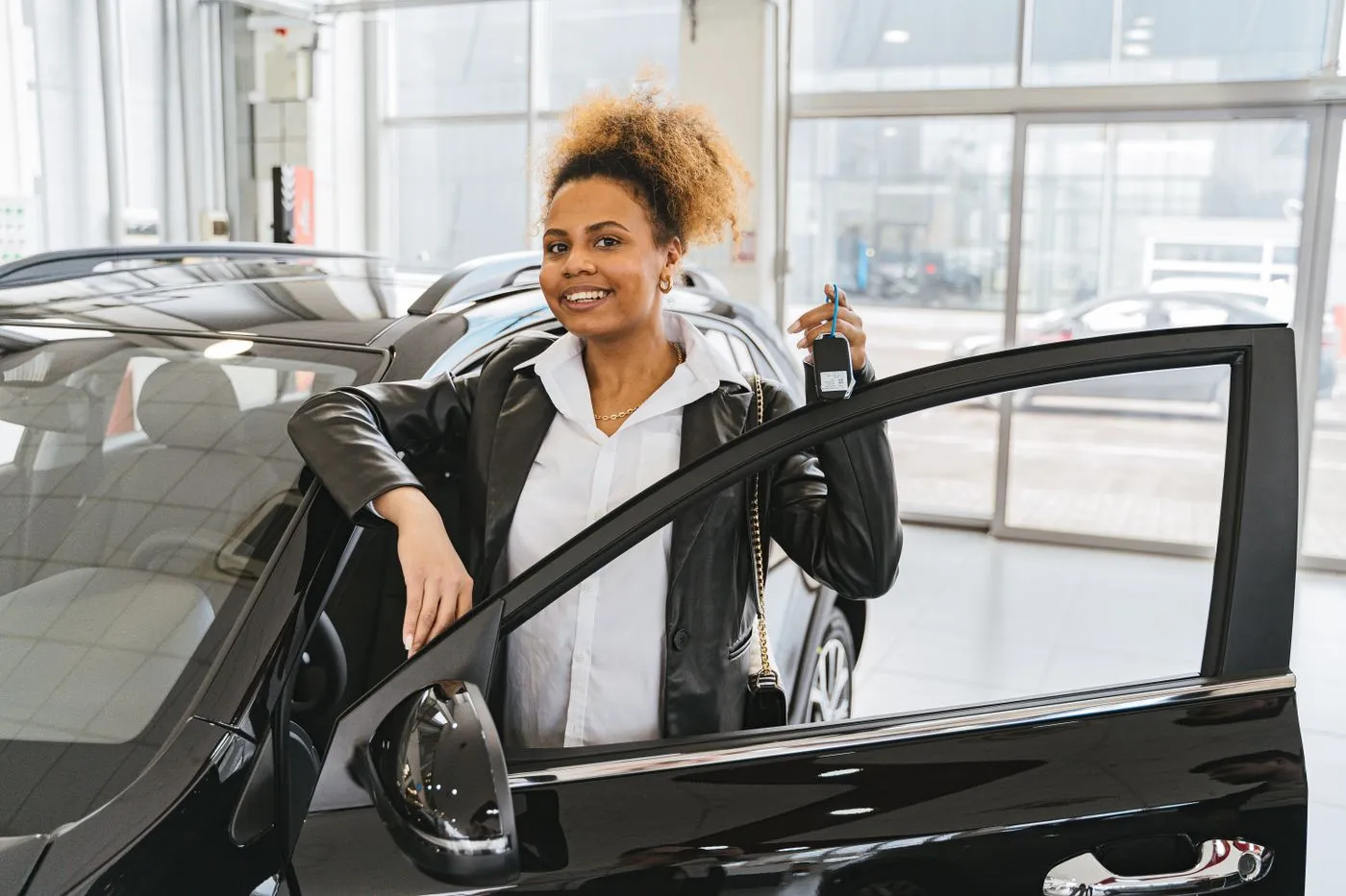 Customer sitting in a car during a test drive at a dealership